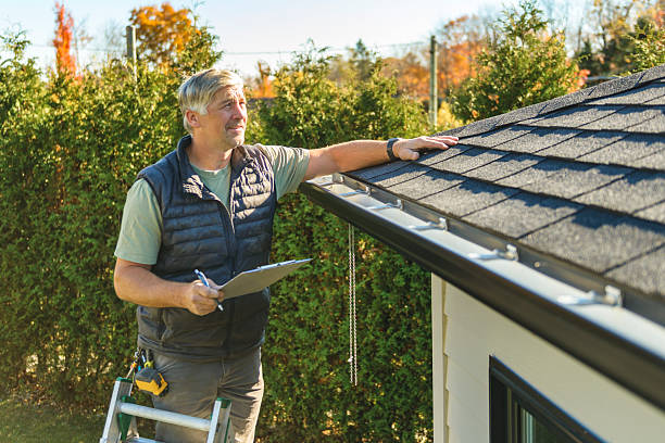 Professional Hail Damage Roof Repair technician working in West Point, NY